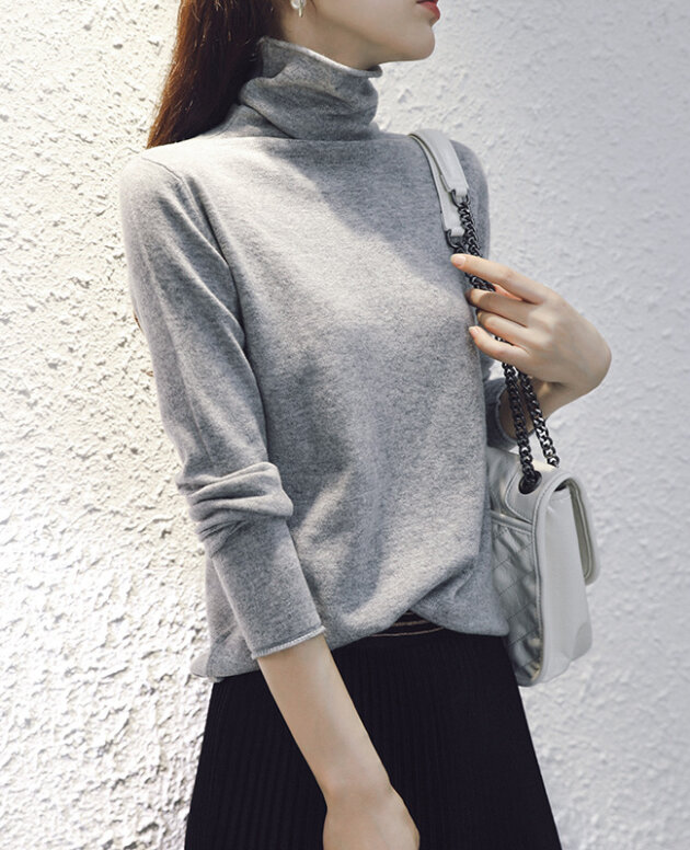 A pile of free - collar cardigans